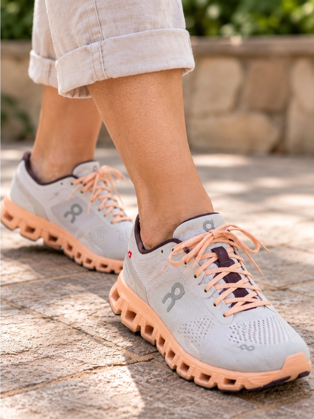 On Running Women’s Cloudace Sneakers in Light Gray and Peach